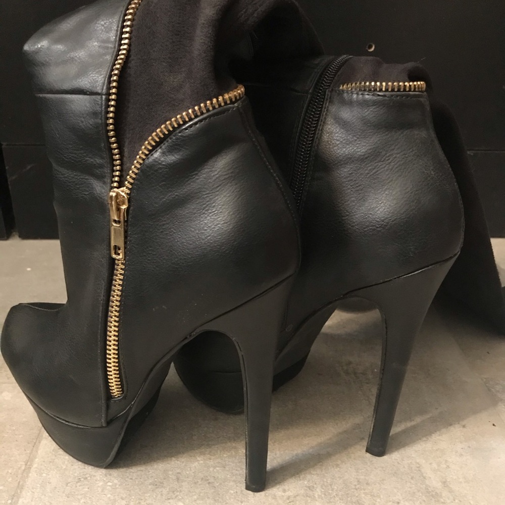 Thigh high black boots